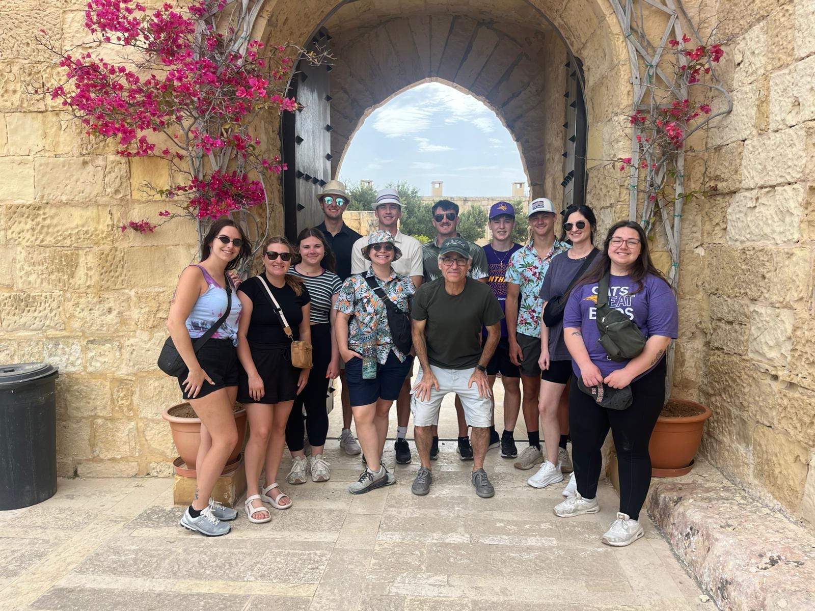 Group posing in the street of Malta
